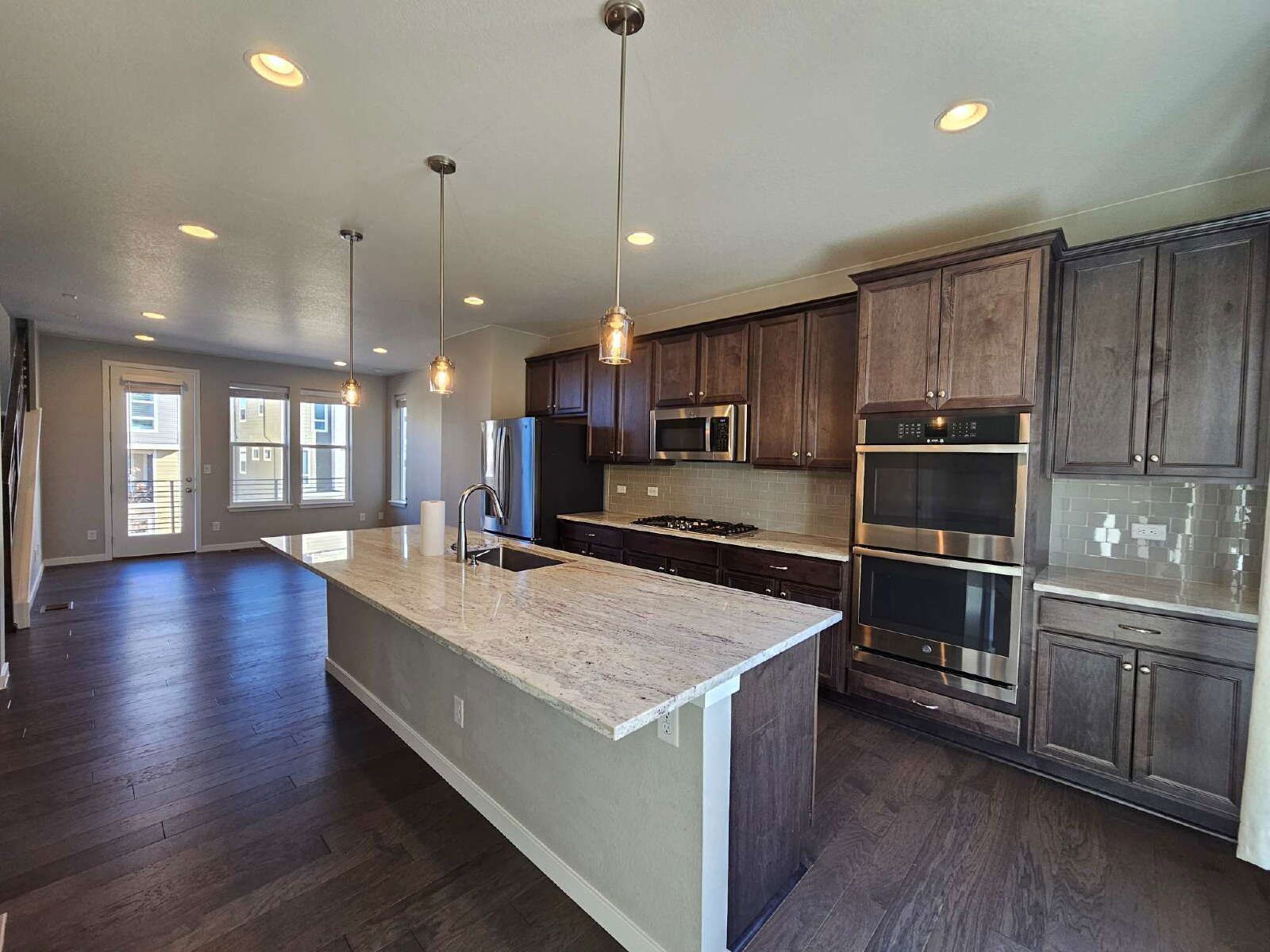 Three-Story Townhome Featuring Quartz Kitchen & Rooftop Balcony in Castle Rock property image