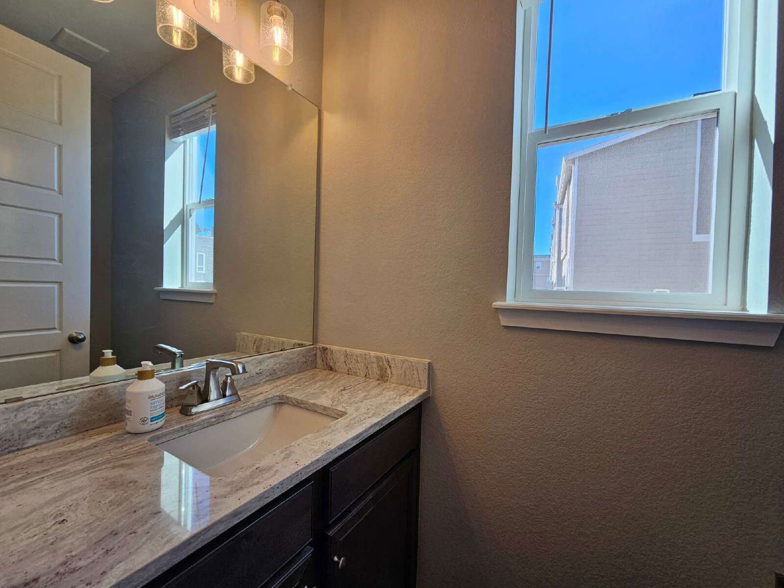 Three-Story Townhome Featuring Quartz Kitchen & Rooftop Balcony in Castle Rock property image